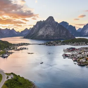 Aerial view, sunset at Reinefjord with mountains Aerial view, sunset at Reinefjord with mountains