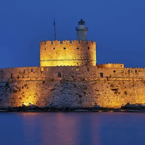 Agios Nikolaos Fortress, impressively illuminated castle at night