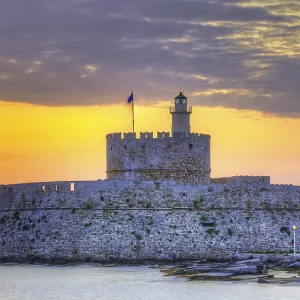 Agios Nikolaos fortress, picturesque castle with lighthouse at sunrise