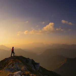 Ammer Mountains with climber at sunrise Ammer Mountains with climber at sunrise