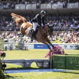 Andre Thieme of Germany and riding DSP Chakaria compete in the first round of the 1 Andre Thieme of Germany and riding DSP Chakaria compete in the first round of the 1