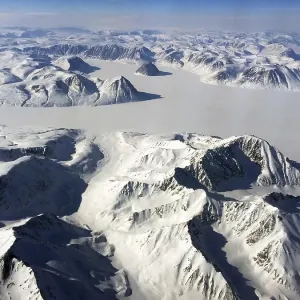 Arctic landscape, snow-covered mountain landscape with glacier Arctic landscape, snow-covered mountain landscape with glacier