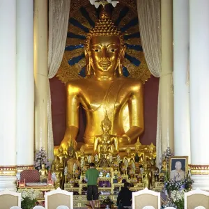 Arm chair and Buddha statue, Chiang Mai