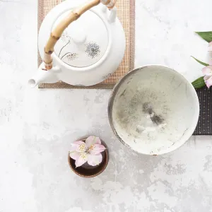 Asian tea ceremony arrangement with white teapot Asian tea ceremony arrangement with white teapot