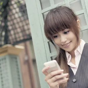 Attractive business woman use cellphone Attractive business woman use cellphone