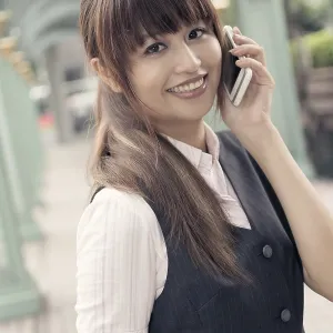Attractive business woman use cellphone Attractive business woman use cellphone