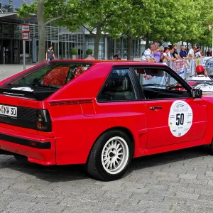 AUDI Sport Quattro, red Audi classic car on a paved road during a rally