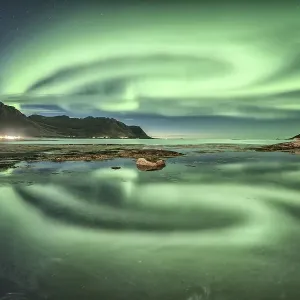 Aurora borealis reflected in the sea