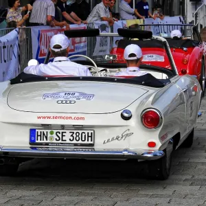 Auto Union 1000 SP, vintage white convertible car seen from behind during an event with spectators
