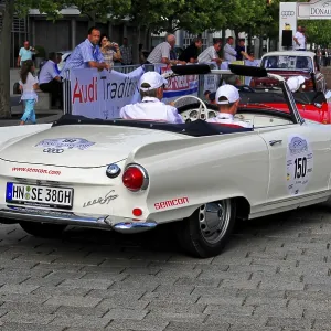 Auto Union 1000 SP, white vintage roadster with people in the background during an event