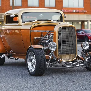 Automobile, car show, custom made vintage car with open engine display Automobile, car show, custom made vintage car with open engine display