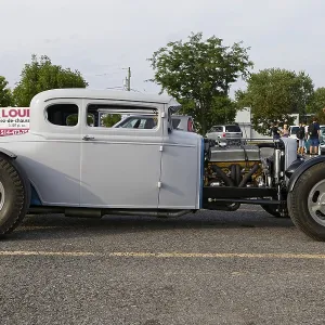 Automobile, car show, custom made vintage car with open engine display Automobile, car show, custom made vintage car with open engine display