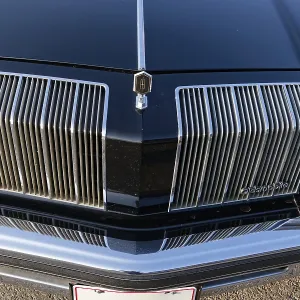 Automobile, front grill of a vintage car
