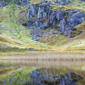 Autumn colors over Mountains and Llyn Cwmorthin Lake