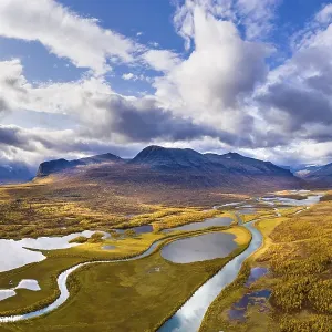 Autumn landscape with river, lakes and mountains