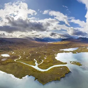 Autumn tundra, river delta of the two rivers Visttasjohka and Laddjujohka Autumn tundra, river delta of the two rivers Visttasjohka and Laddjujohka
