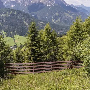 Avalanche protection in the high mountains with a view of the Dolomites