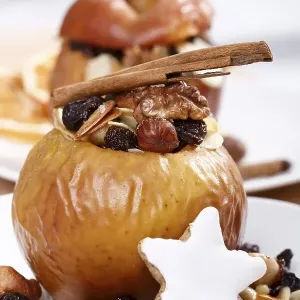 Baked apple with raisins, nuts
