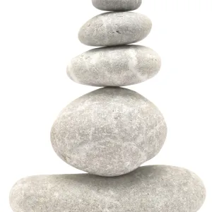Balancing stone tower isolated on white background Balancing stone tower isolated on white background