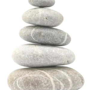 Balancing stone tower isolated on white background Balancing stone tower isolated on white background