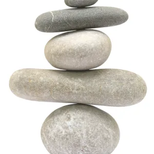 Balancing stone tower isolated on white background Balancing stone tower isolated on white background