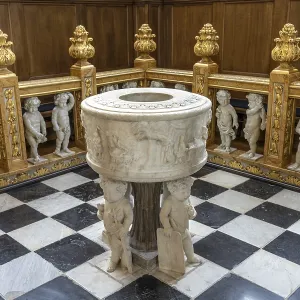 Baptismal font in the interior of the Evangelical Lutheran Church of the Saviour in front of Frelsers Kirke Baptismal font in the interior of the Evangelical Lutheran Church of the Saviour in front of Frelsers Kirke