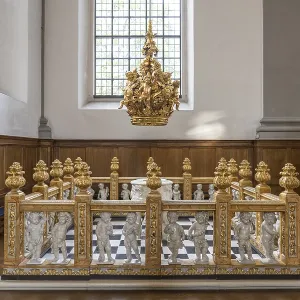 Baptismal font in the interior of the Evangelical Lutheran Church of the Saviour in front of Frelsers Kirke Baptismal font in the interior of the Evangelical Lutheran Church of the Saviour in front of Frelsers Kirke
