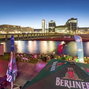 Beach bar Capital Beach at dusk at the river Spree opposite central railway station