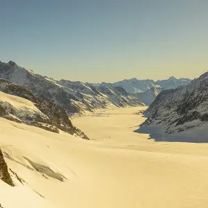 Beautiful Aletsch Glacier in a Sunny Winter Day with Snowcapped Mountain with Sunlight in Jungfraujoch in Berner