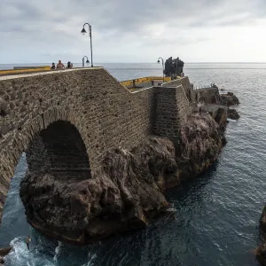 Beautiful coastline of Ponta do Sol in summer and a sea walk called Cais da