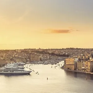 Beautiful panorama of Three Cities and harbour in Malta at sunrise