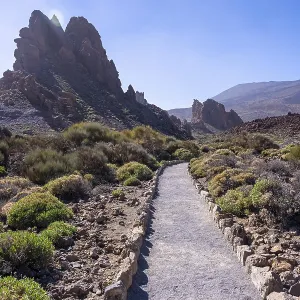 Beautiful path between the Roques de Gracia and the Roque Cinchado in the natural area of Teide in Tenerife Beautiful path between the Roques de Gracia and the Roque Cinchado in the natural area of Teide in Tenerife