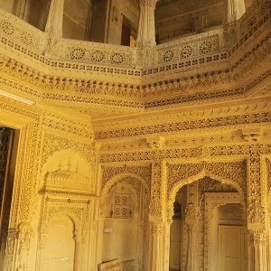 Several beautifully carved arch doors made by sandstones inside temple at Amarsagar Lake