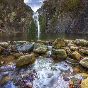 Beauty autumn view on a waterfall