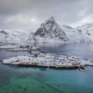 Belbe stilt houses at turquoise sea in winter