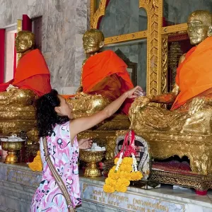 Believers giving offerings Wat Chalong Phuket Island Southern Thailand Southeast Asia