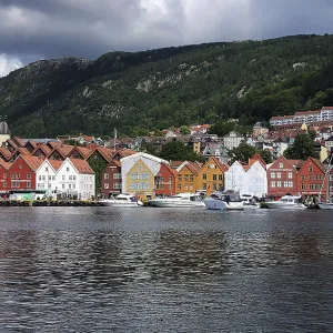 Bergen, Hordaland, Norway, Traditional colourful wooden houses in the Bryggen harbour district Bergen, Hordaland, Norway, Traditional colourful wooden houses in the Bryggen harbour district