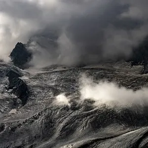 Bernina Group with Rosegg Glacier and dramatic clouds at blue hour Bernina Group with Rosegg Glacier and dramatic clouds at blue hour