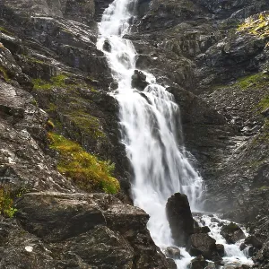 The big waterfall in mountains of Norway