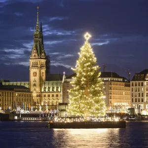 Binnenalster lake with Christmas tree and Town Hall at Christmas time Binnenalster lake with Christmas tree and Town Hall at Christmas time