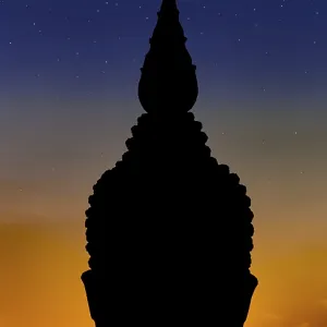The black outline of Buddha head on color background with stars on heaven