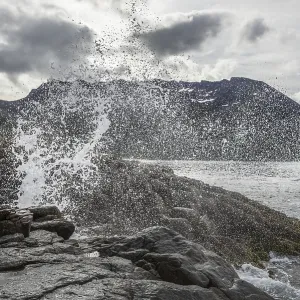 Blowhole on the coast, island of Senja