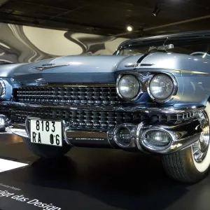 Blue classic car with eye-catching chrome design and characteristic headlights