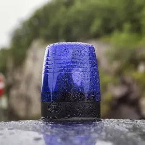 Blue light on a car roof, police patrol car Blue light on a car roof, police patrol car