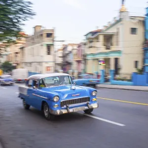 Blue oldtimer in Cubas capital with blurred background Blue oldtimer in Cubas capital with blurred background