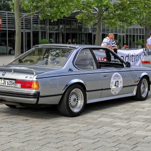 BMW 635 CSI, rear view of a silver BMW classic car at a rally