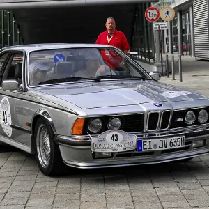 BMW 635 CSI, A silver BMW vintage sports car at an automotive event on a paved road