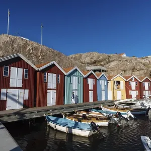 Boats and colourful boathouses in the harbour of Smoegen Boats and colourful boathouses in the harbour of Smoegen