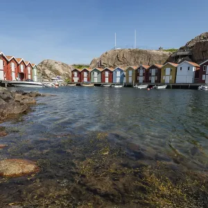 Boats and colourful boathouses in the harbour of Smoegen Boats and colourful boathouses in the harbour of Smoegen