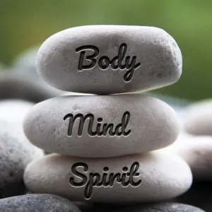 Body, Mind and Spirit words engraved on zen stones